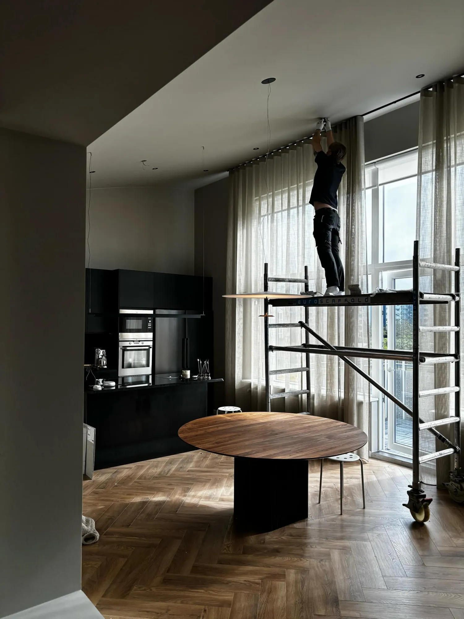 Working on lighting from a scaffold