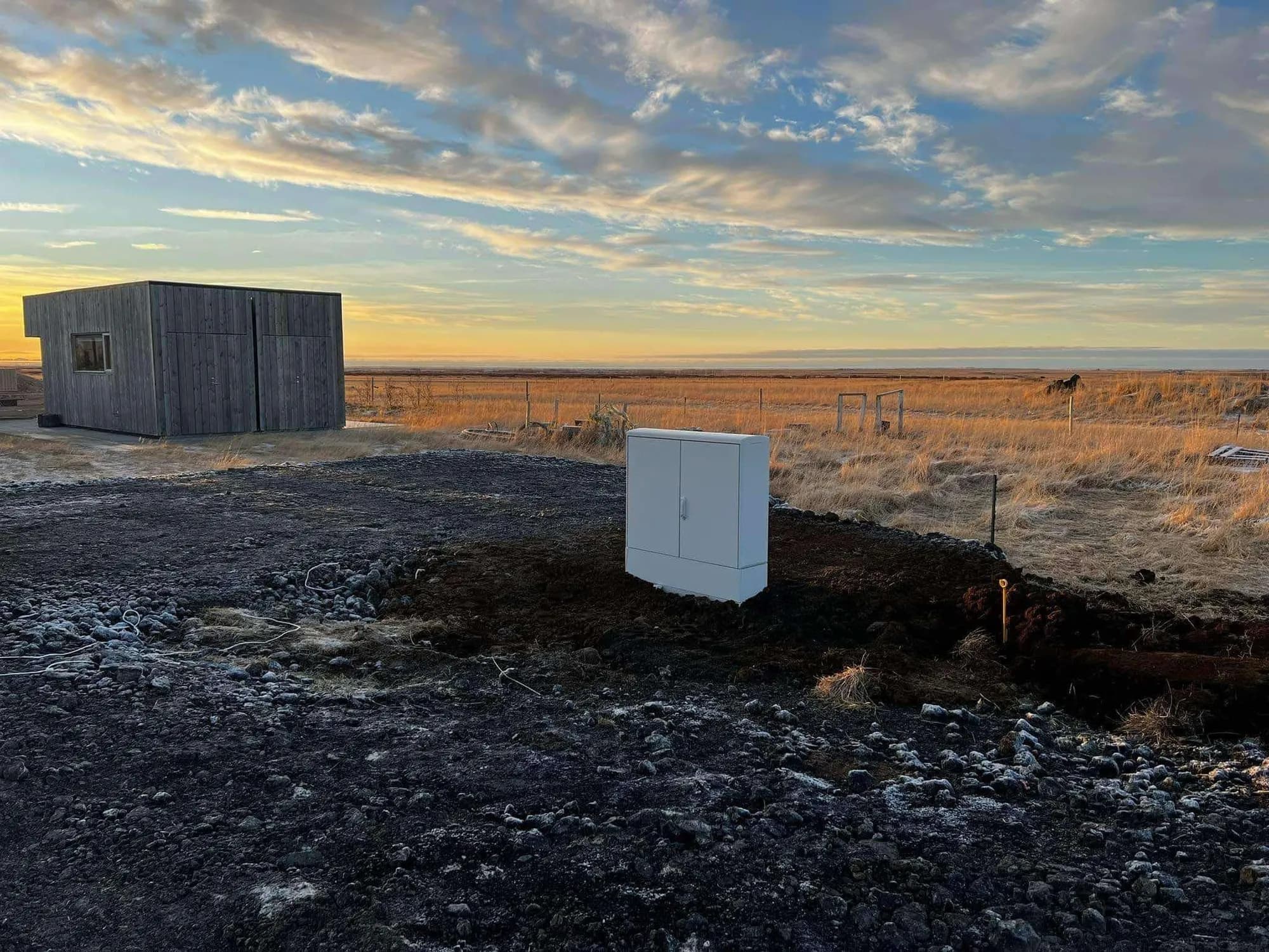 Outdoor electrical cabinet at sunset
