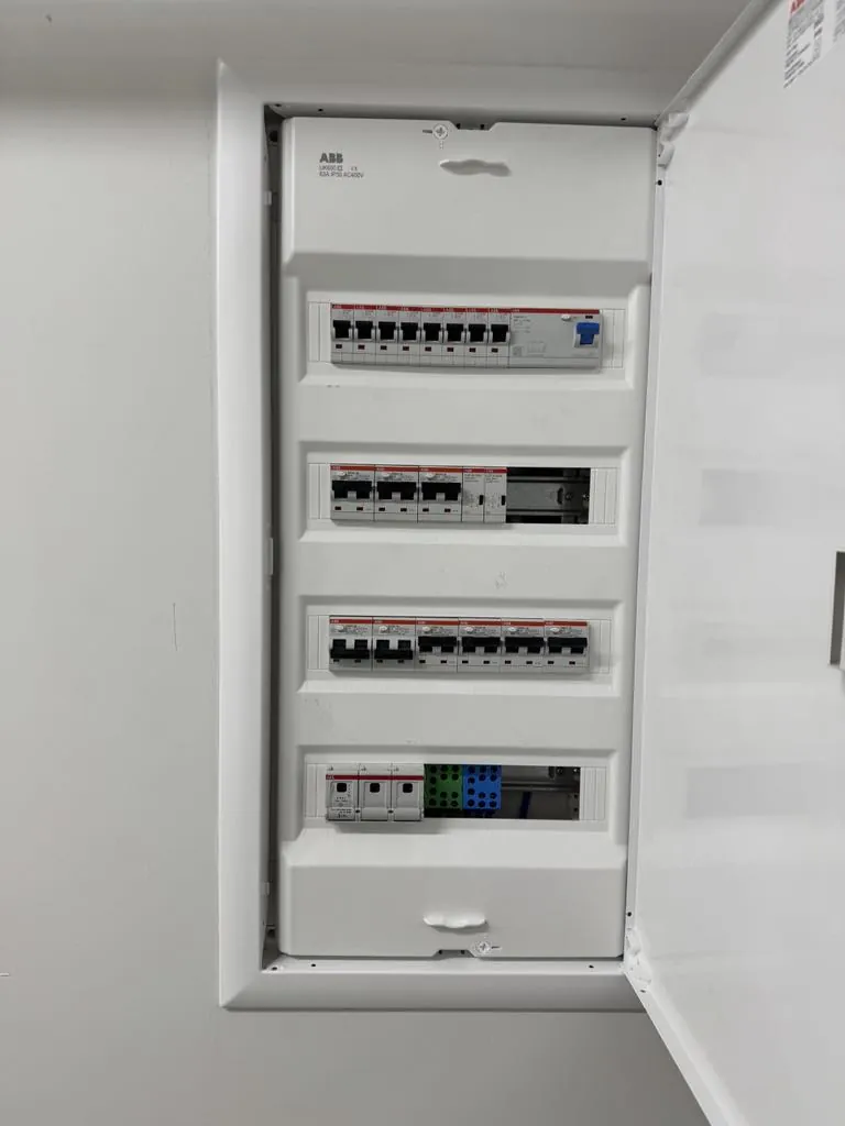Small distribution board recessed into a wall