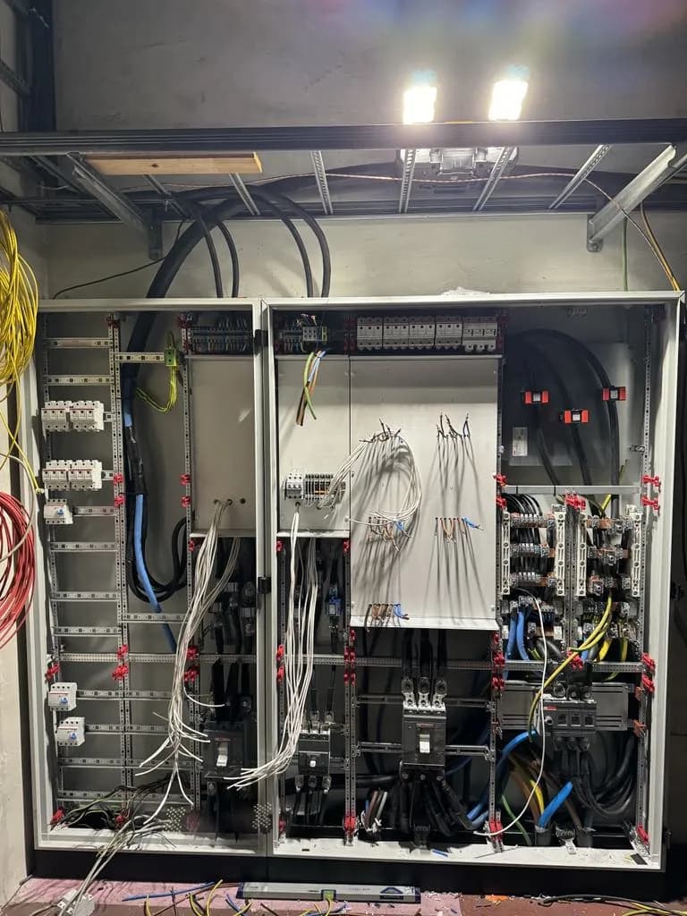 Control cabinet with wiring in progress