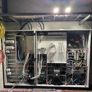 Control cabinet with wiring in progress
