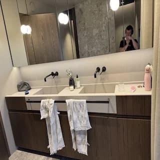 Bathroom with lighting around the mirror